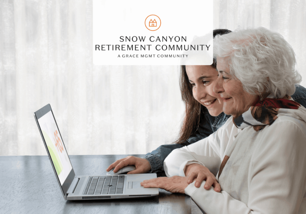 Snow Canyon - Life Stories - Snow Canyon two women looking at a computer screen