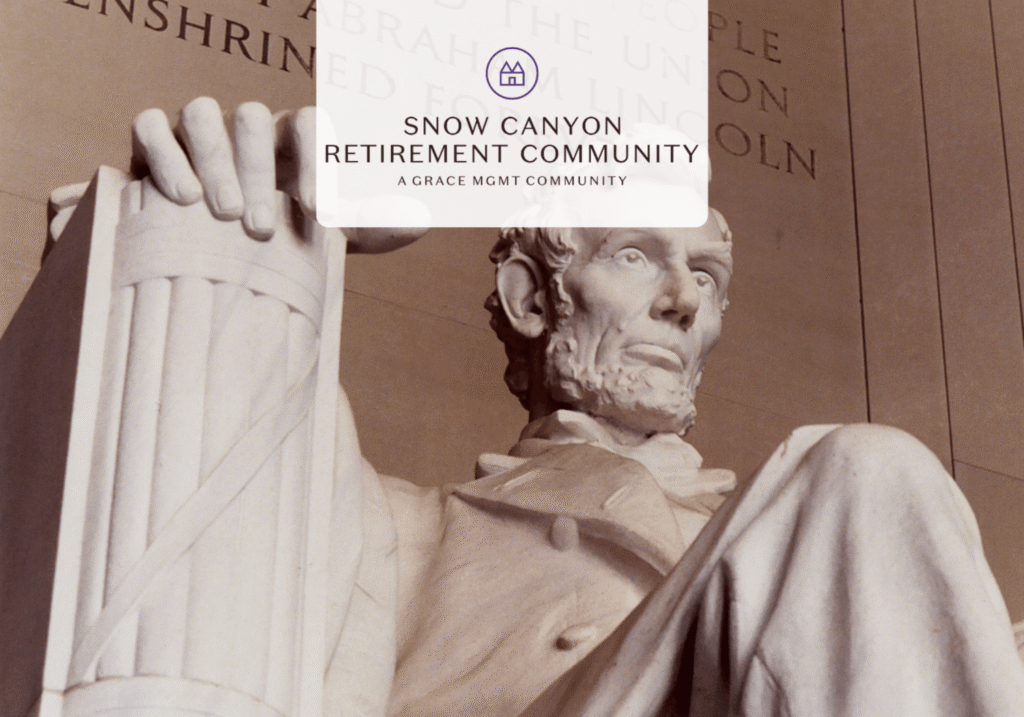 Statue of Abraham Lincoln from the Lincoln Memorial with a translucent white panel displaying the Snow Canyon Retirement Community logo and name.