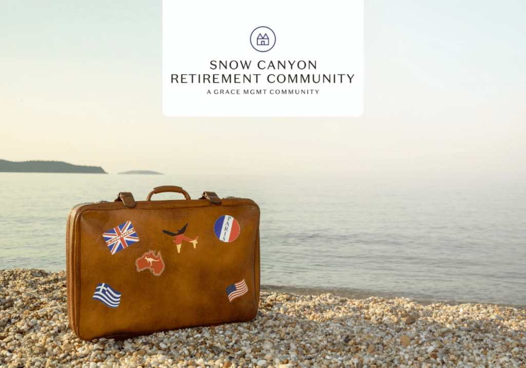 Brown vintage suitcase with travel decals on a pebbled beach, calm sea in the background; Snow Canyon Retirement Community logo overlay at top.